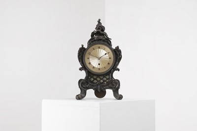Lot 287 - A cast bronze rococo-style mantel clock