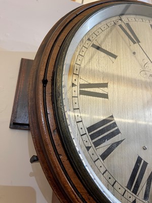 Lot 294 - A mahogany wall clock