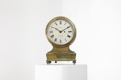 Lot 519 - A large brass cased balloon-shaped mantel clock