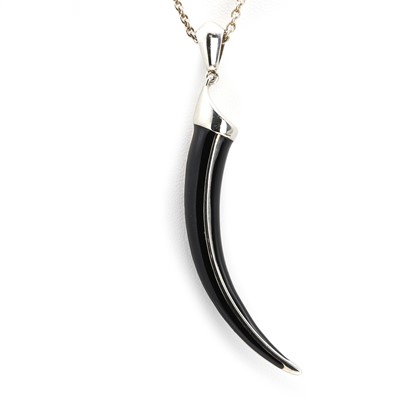 Lot 1267 - A sterling silver black enamel 'Tusk' pendant, by Shaun Leane