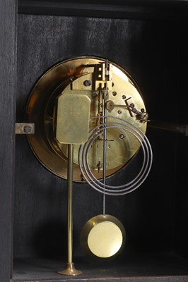 Lot 26 - An Aesthetic Movement ebonised mantel clock