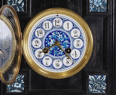 Lot 26 - An Aesthetic Movement ebonised mantel clock
