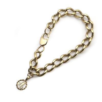 Lot 478 - A gold curb link bracelet