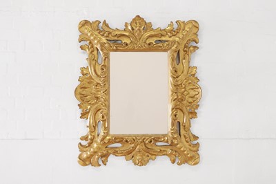 Lot 448 - A carved giltwood wall mirror