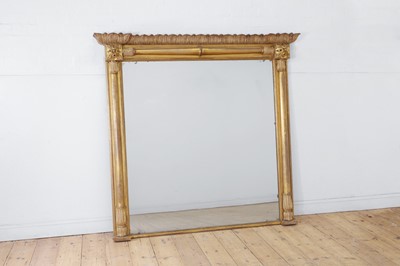 Lot 246 - A George IV carved giltwood and composition overmantel mirror