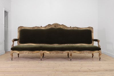 Lot 633 - A large Louis XV-style carved giltwood canapé