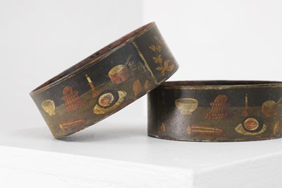 Lot 580 - A pair of Regency toleware coasters