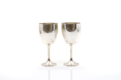 Lot 1 - A pair of silver cups