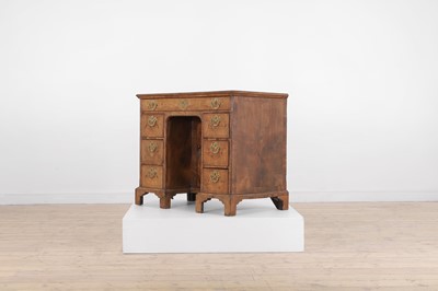 Lot 360 - A George II walnut kneehole desk