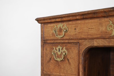 Lot 360 - A George II walnut kneehole desk