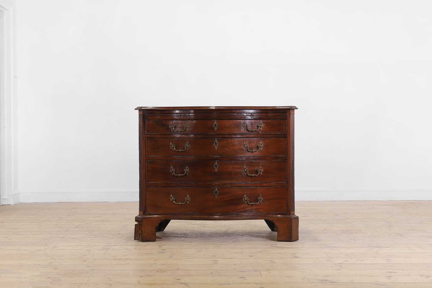 Lot 436 - A George III mahogany serpentine chest of drawers