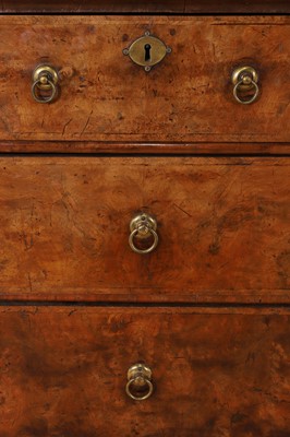 Lot 98 - A walnut cabinet on chest