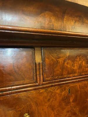 Lot 98 - A walnut cabinet on chest