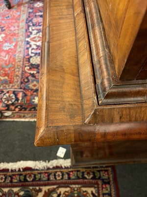 Lot 98 - A walnut cabinet on chest