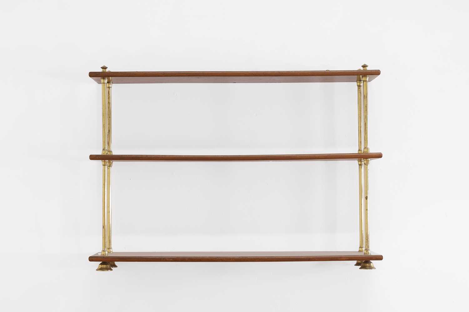 Lot 444 - A set of Regency-style mahogany and brass hanging shelves