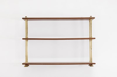 Lot 444 - A set of Regency-style mahogany and brass hanging shelves