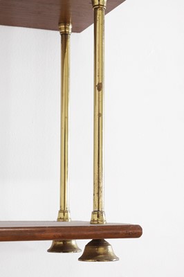 Lot 444 - A set of Regency-style mahogany and brass hanging shelves