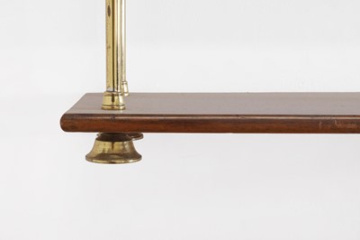 Lot 444 - A set of Regency-style mahogany and brass hanging shelves