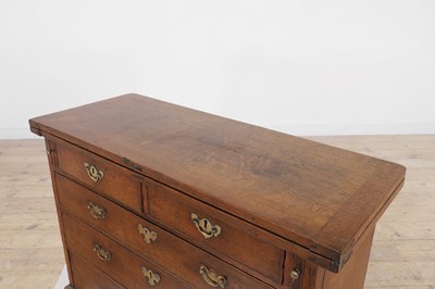 Lot 445 - A small George II oak bachelor's chest