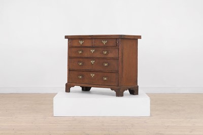 Lot 445 - A small George II oak bachelor's chest