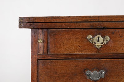 Lot 445 - A small George II oak bachelor's chest