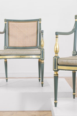 Lot 351 - A pair of Regency-style painted and parcel-gilt elbow chairs