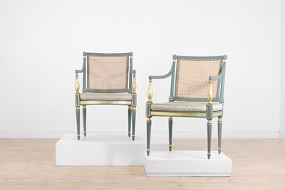 Lot 351 - A pair of Regency-style painted and parcel-gilt elbow chairs