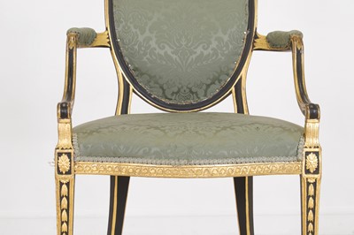 Lot 376 - A George III-style painted pine elbow chair