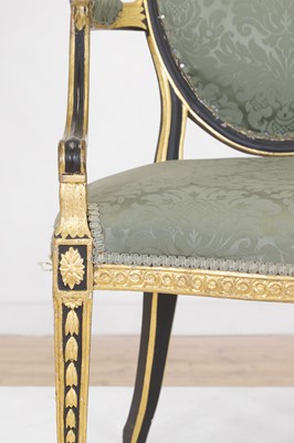 Lot 376 - A George III-style painted pine elbow chair