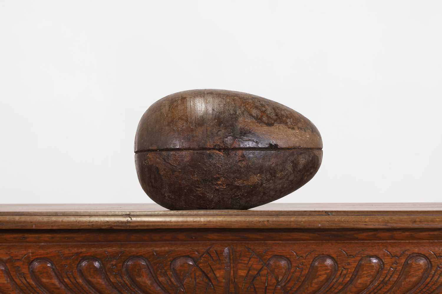 Lot 226 - A turned wood, papier mâché egg mould