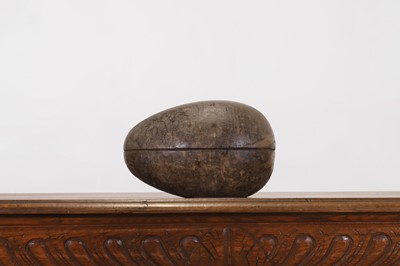 Lot 226 - A turned wood, papier mâché egg mould