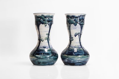 Lot 131 - A pair of William Moorcroft 'Hazeldene' vases