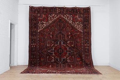 Lot 133 - A Persian Heriz wool carpet