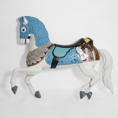 Lot 182 - A carved and painted hardwood fairground horse in the manner of Charles Loof