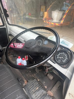 Lot 163 - A 1980 Bedford rigid body lorry, containing a showman's hoopla, shooting gallery and a coconut shy