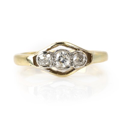 Lot 110 - A gold diamond three stone ring