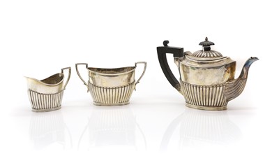 Lot 59 - A Victorian silver three piece bachelor’s tea service