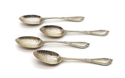 Lot 95 - A set of four Victorian Grecian pattern silver serving spoons