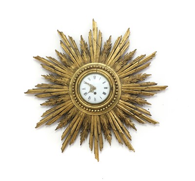 Lot 344 - A French carved gilt wood Sunburst timepiece