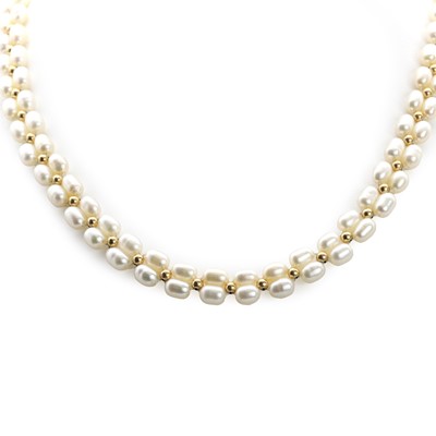 Lot 186 - A cultured freshwater pearl and gold bead necklace