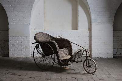 Lot 369 - An iron-framed bath chair