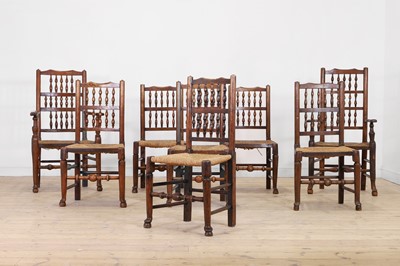 Lot 661 - A harlequin set of eight ash and elm dining chairs