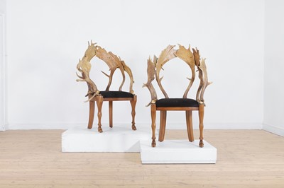 Lot 309 - A pair of oak and stag antler side chairs by Anthony Redmile
