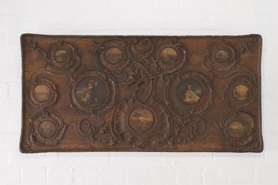 Lot 187 - A carved oak panel