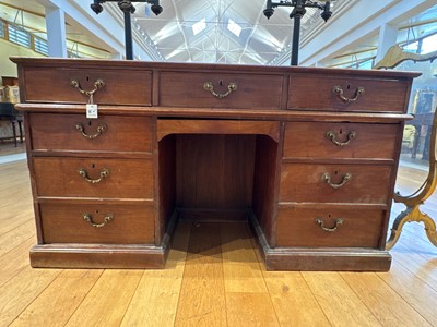 Lot 88 - A large George III mahogany library desk