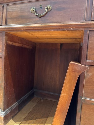 Lot 88 - A large George III mahogany library desk