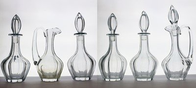 Lot 129 - A set of four cut crystal decanters