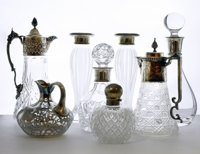 Lot 120 - A collection of silver mounted decanters