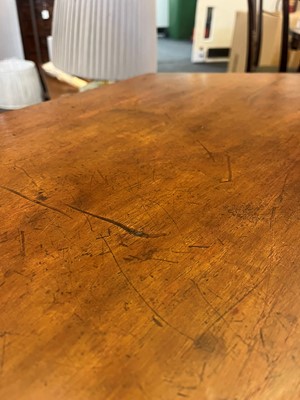 Lot 17 - A walnut centre table