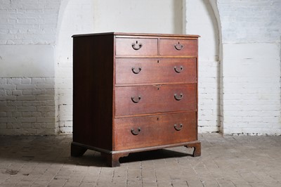 Lot 56 - A George III oak chest of drawers